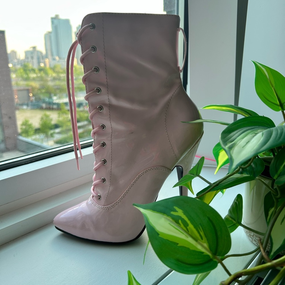 Dolls Kill Pink Heeled Boots with Sleek Design